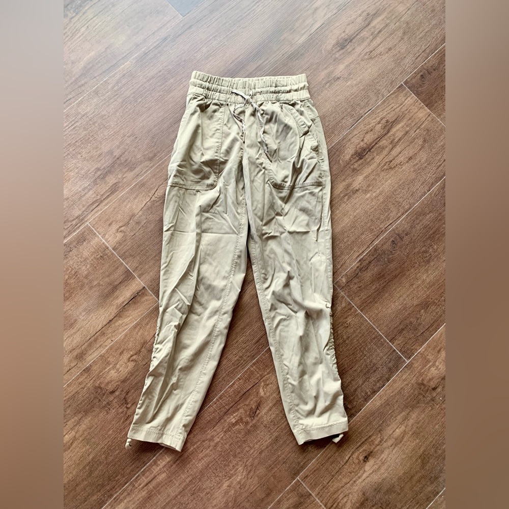 khaki colored North Face joggers extra